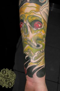 skull tattoo by justin acca