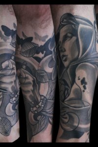 Black grey tattoo by Justin Acca Assassin modeled by Lucia Mocnay